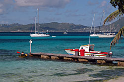 Boats and barrels around PSV small jetty